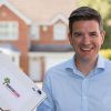 Nat Southworth holding bricksub paperwork