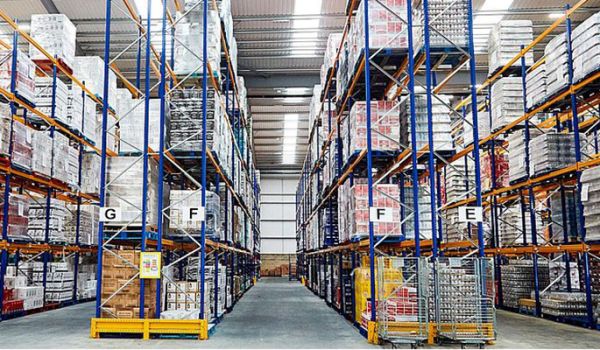 Large shelving units full of stock in a warehouse