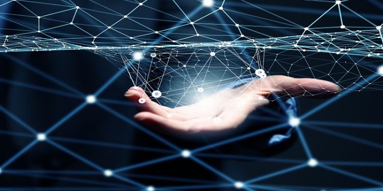 The picture depicts an intricate web of wireless connections in the palm of a person's hands.