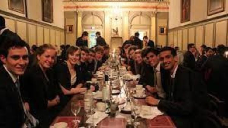 High table depicting male and female student dining in Formal Hall, Jesus College, University of Cambridge