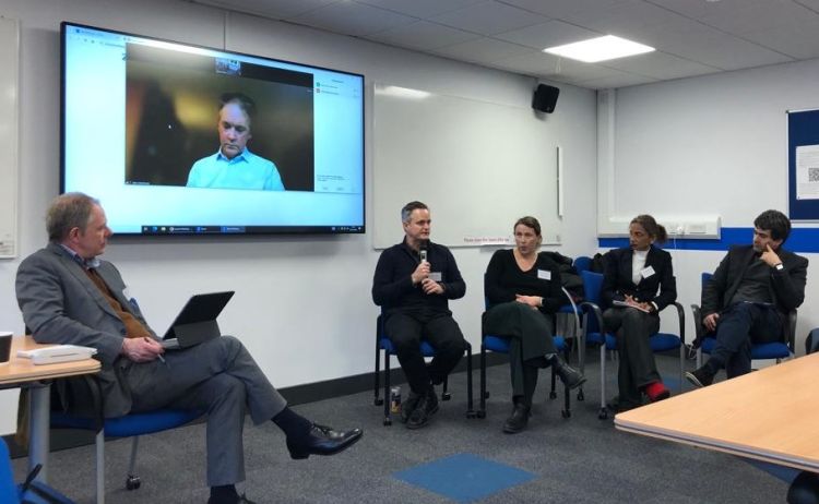 Professor Mark Stuart chairs a hybrid panel of experts.
