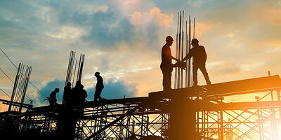 Image of construction workers on a scaffold