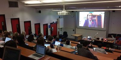 Photograph of the lecture theatre, showing students attending the lecture.
