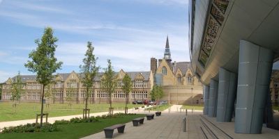 Picture of the Western campus including back of Maurice Keyworth building and blue sky.
