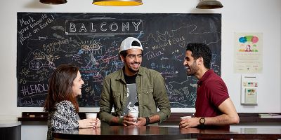 Students socialising in Leeds University Union Cafe
