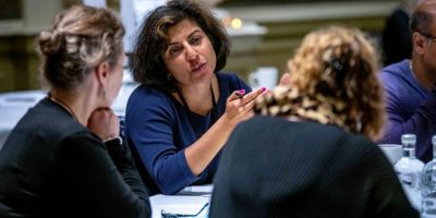 SME leaders sat around a table in discussion
