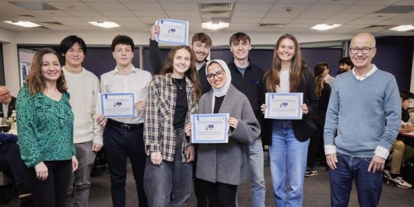 One group of students winning their prize from the event