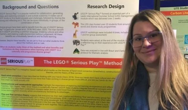 Nathalie Benesova stood in front of her research poster
