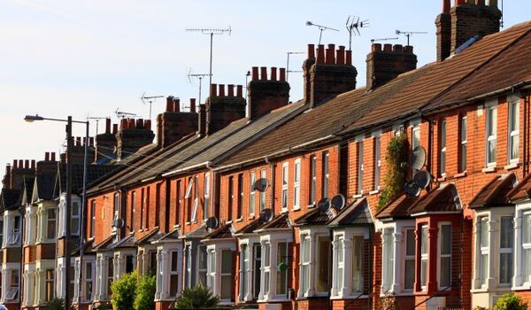 Row of terraced houses on a sunny day
