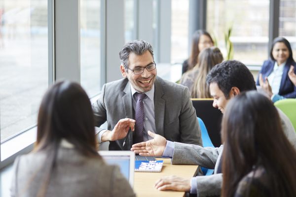 MBA students around a table