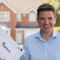 Nat Southworth holding bricksub paperwork