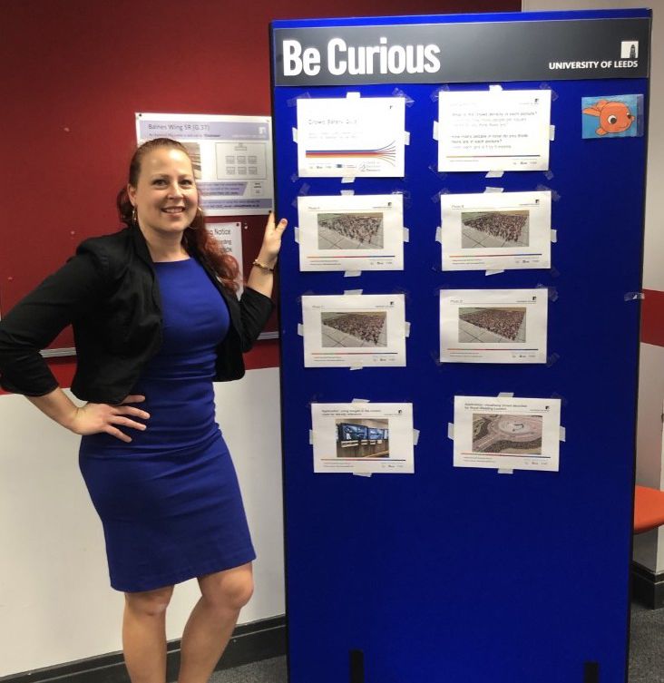 Dr Natalie Van Der Wal standing by the quiz photos