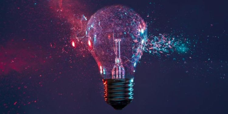Pink and blue lightbulb exploding