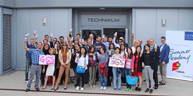 A group of MBA students standing outside the GGS