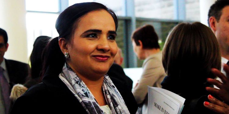 Close-up of a woman smiling at an ISABC event