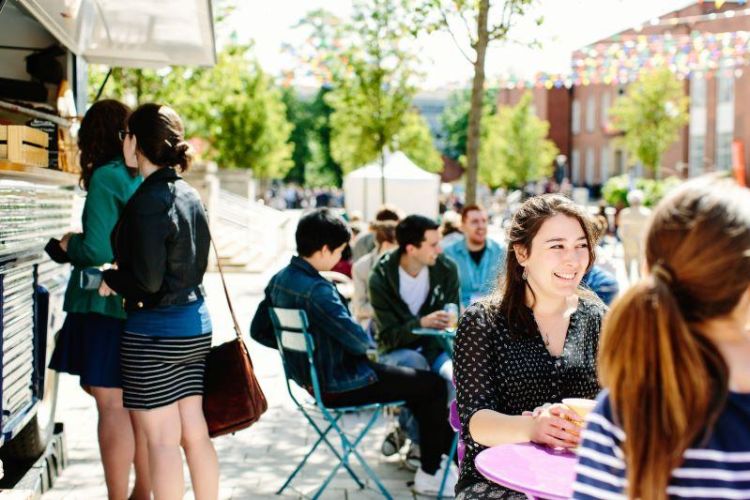 Students sat outside on campus