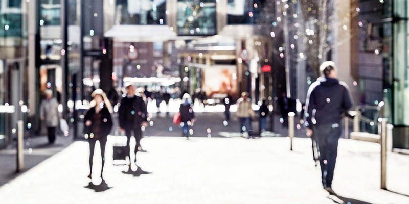 A blurry shot of a retail high street in the centre of Leeds